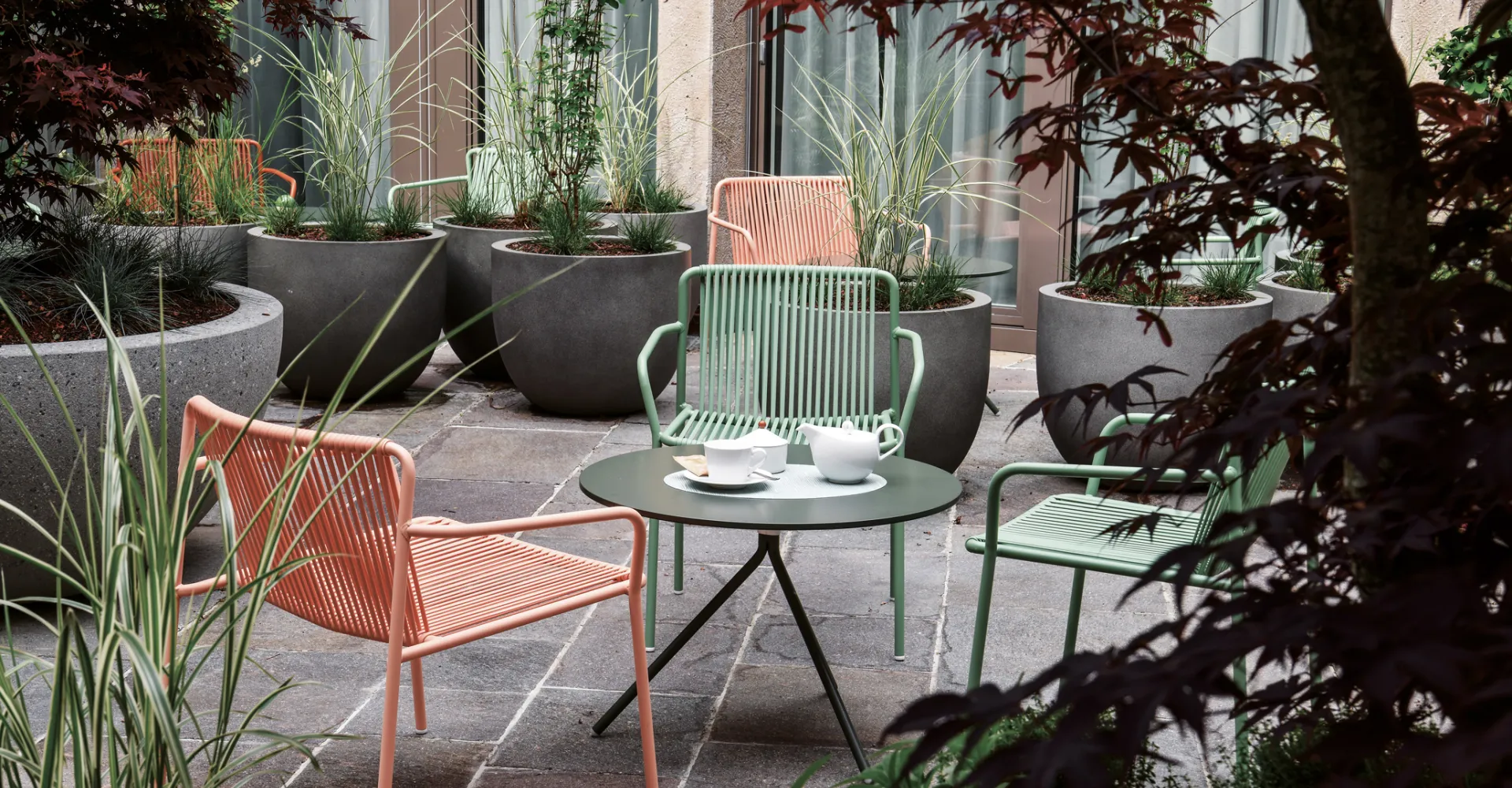 Seating area in the courtyard of the Sorell Hotel St. Peter