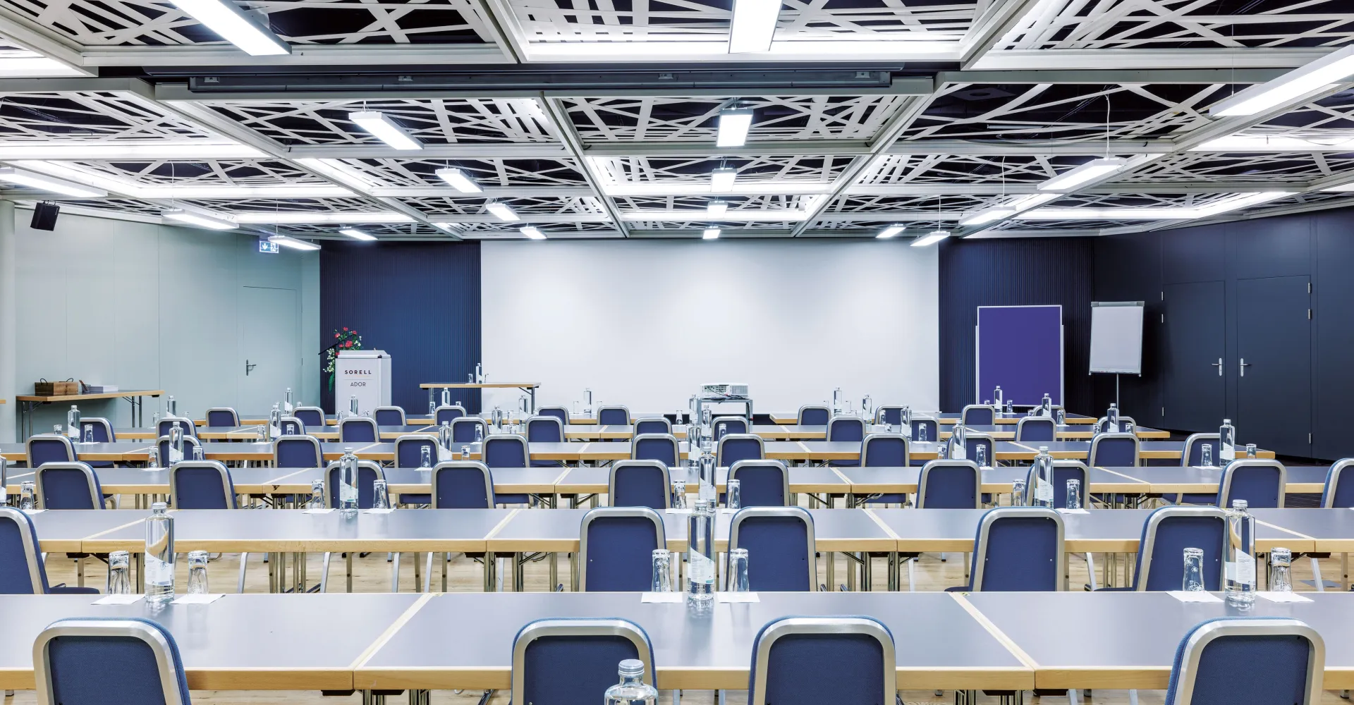 Seminar room with tables and chairs in a row