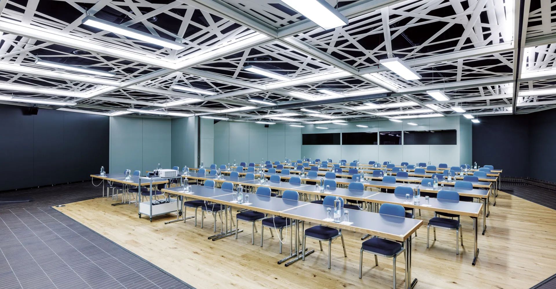 Seminar room with tables and chairs in a row