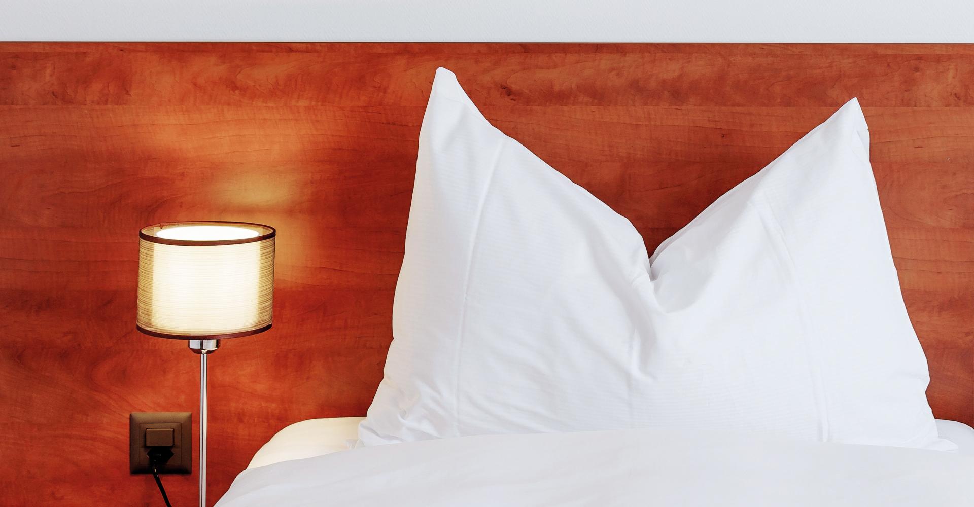 Detailaufnahme des Betts im Superior Double Twin Zimmer