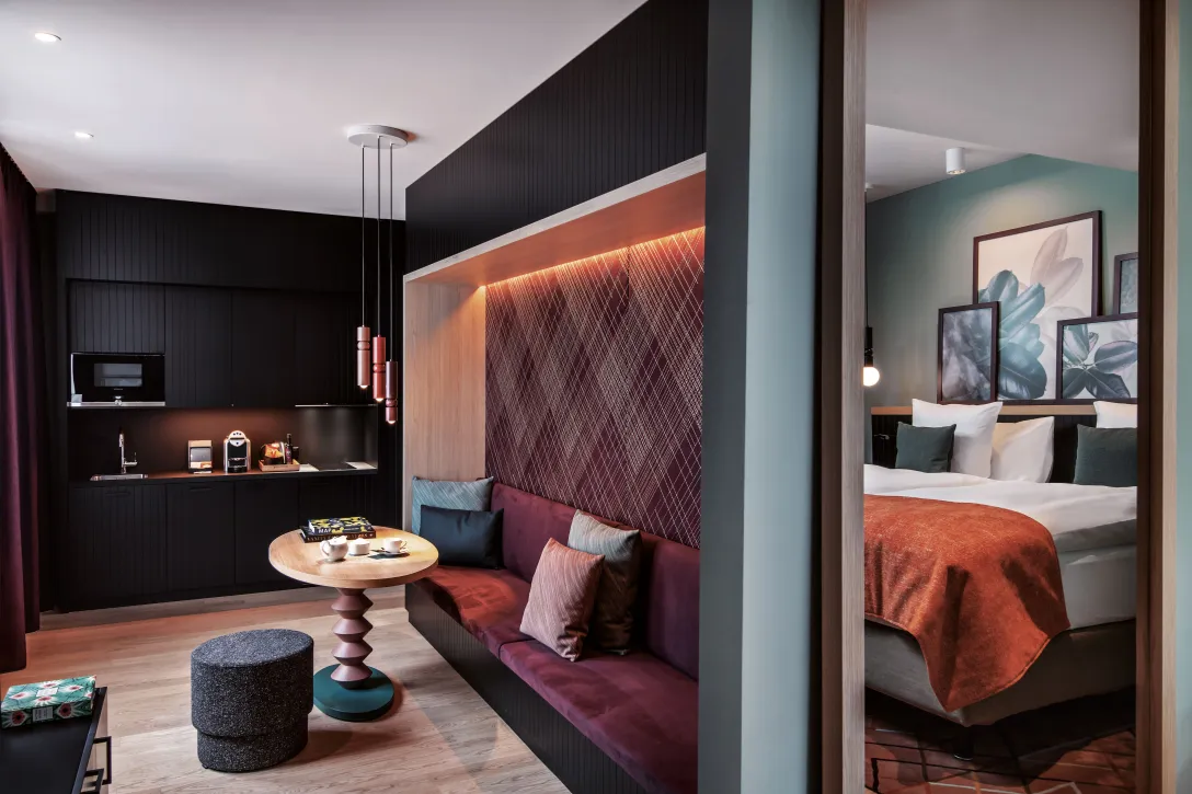 Sorell Hotel St. Peter Grand Deluxe Room with kitchenette and sitting area