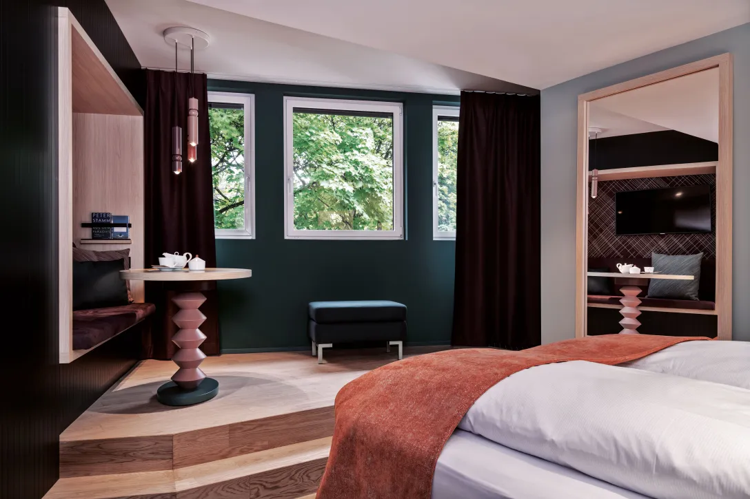 Sorell Hotel St. Peter Grand Deluxe Room King/Twin Bedroom with Seating Area