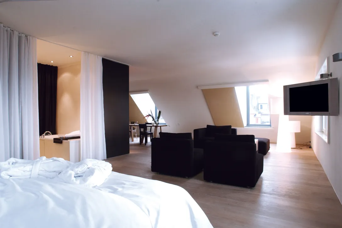 Sorell Hotel Rigiblick Grand Studio Bedroom with sitting area