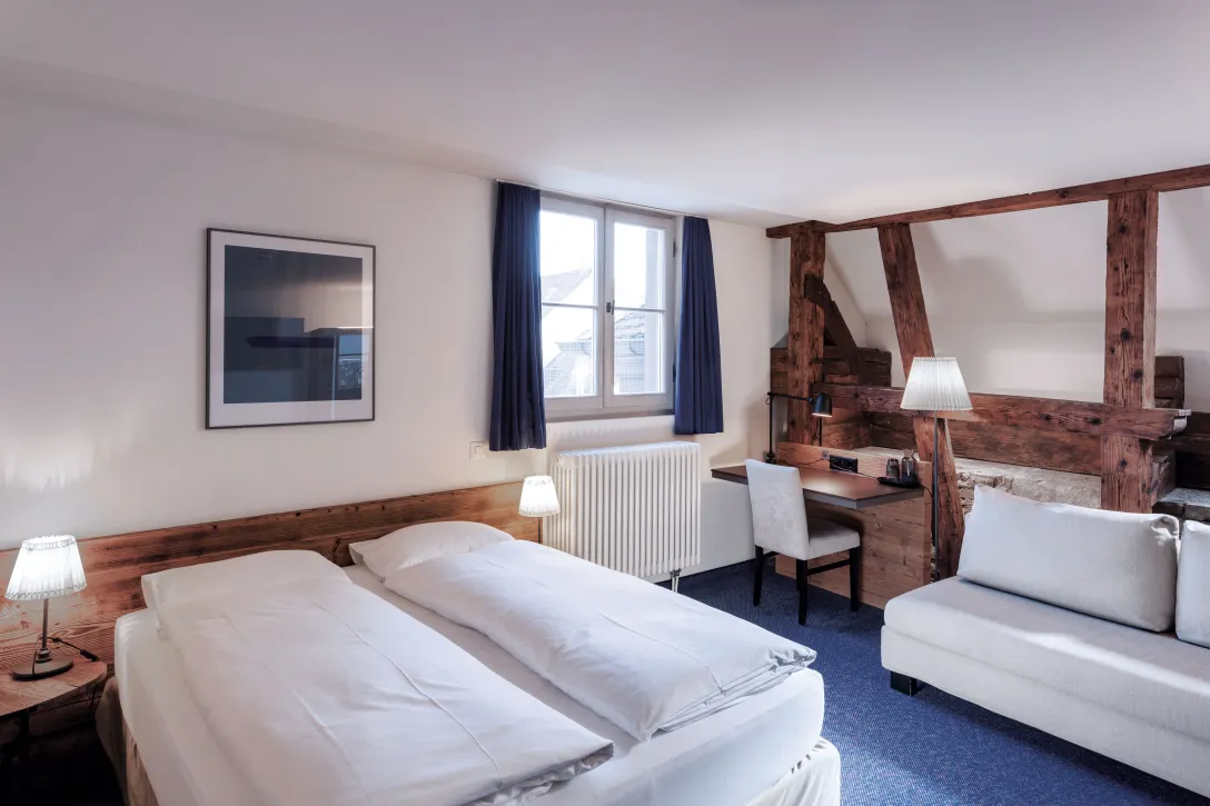 Sorell Hotel Rüden superior room with desk and sitting area