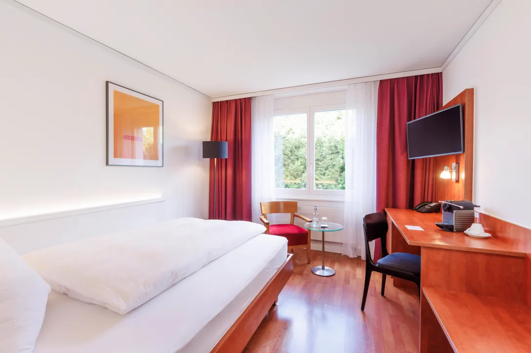 Business King Zimmer mit Queen Size Bett