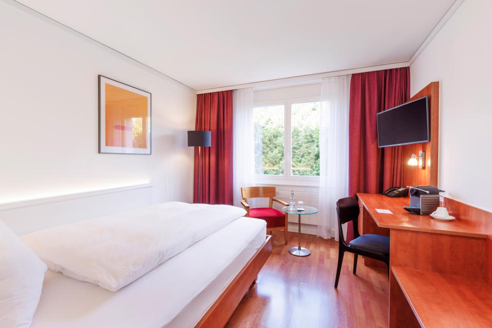 Business King Zimmer mit Queen Size Bett