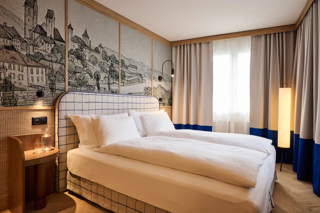 Bett Dulixkingzimmer im Hotel Speer