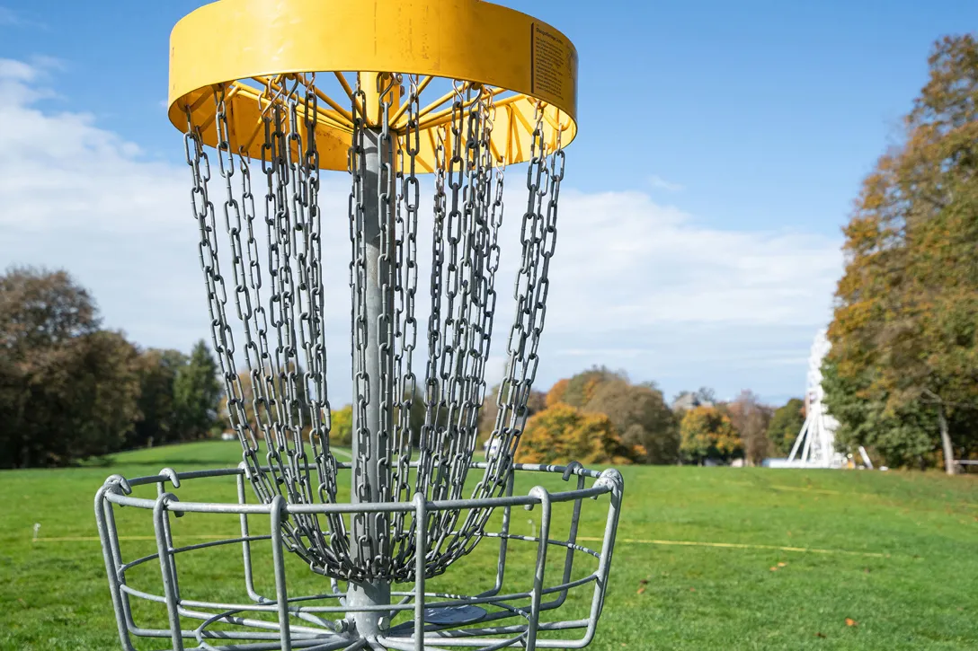 Disc golf basket in the park