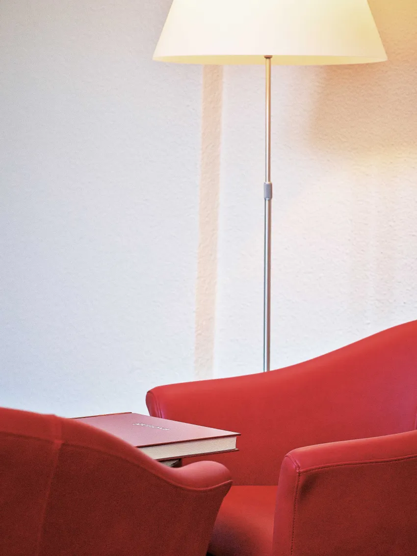 Close-up of a seating area with lamp