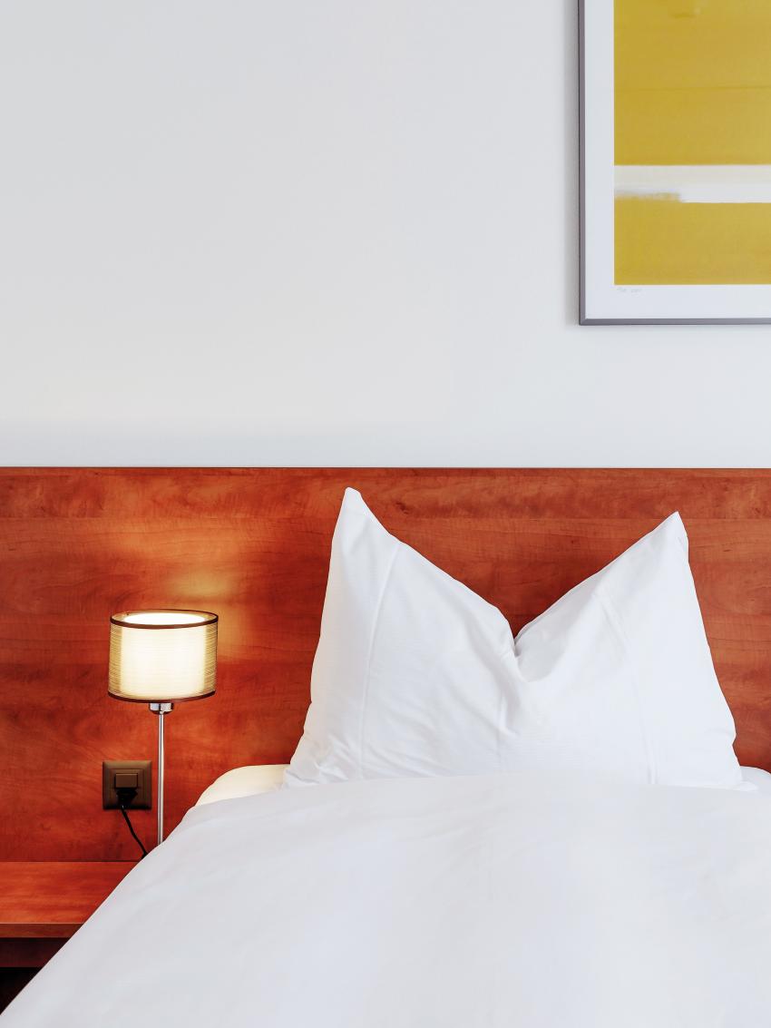 Detailaufnahme des Betts im Superior Double Twin Zimmer