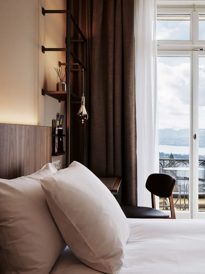 Photo of the bed in the Superior Room with Balcony