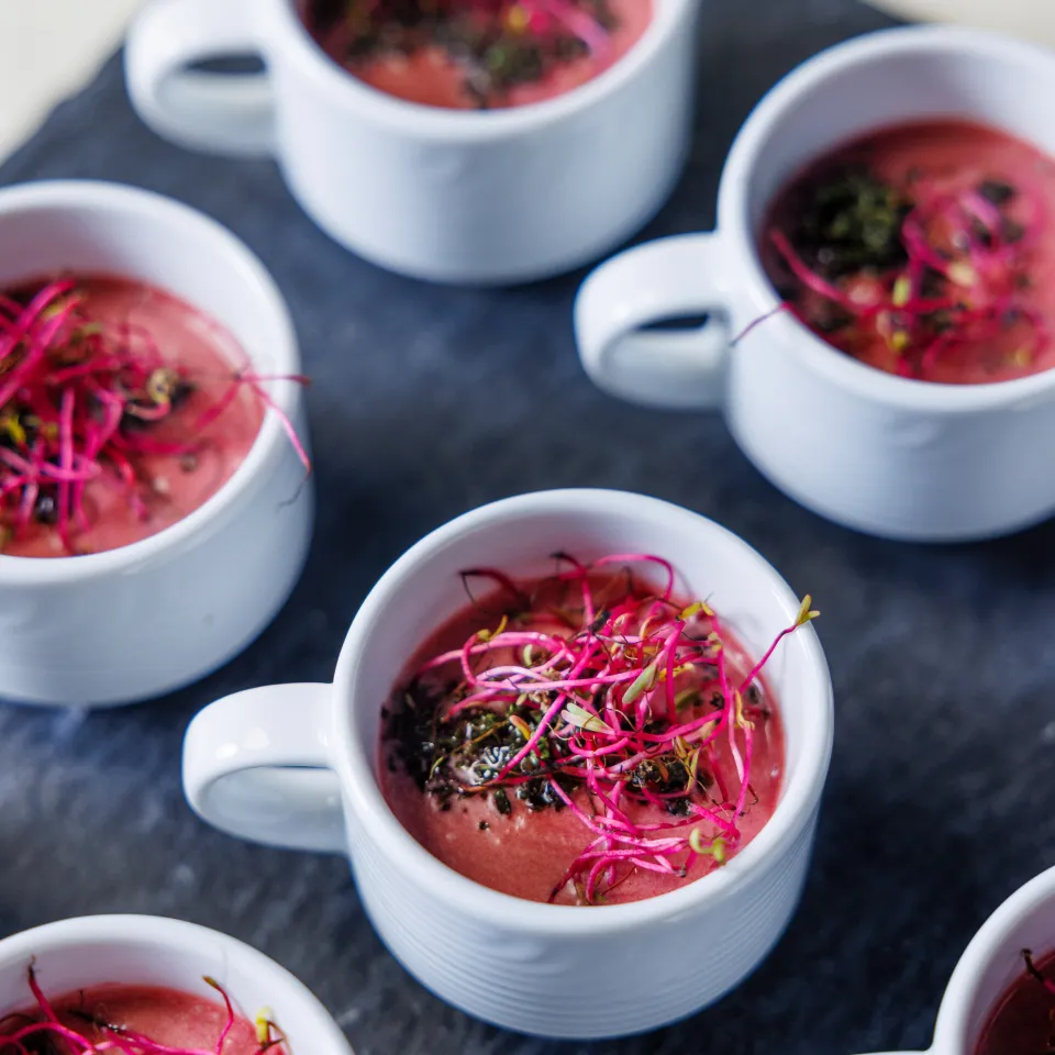 Aperitif with soup in a cup