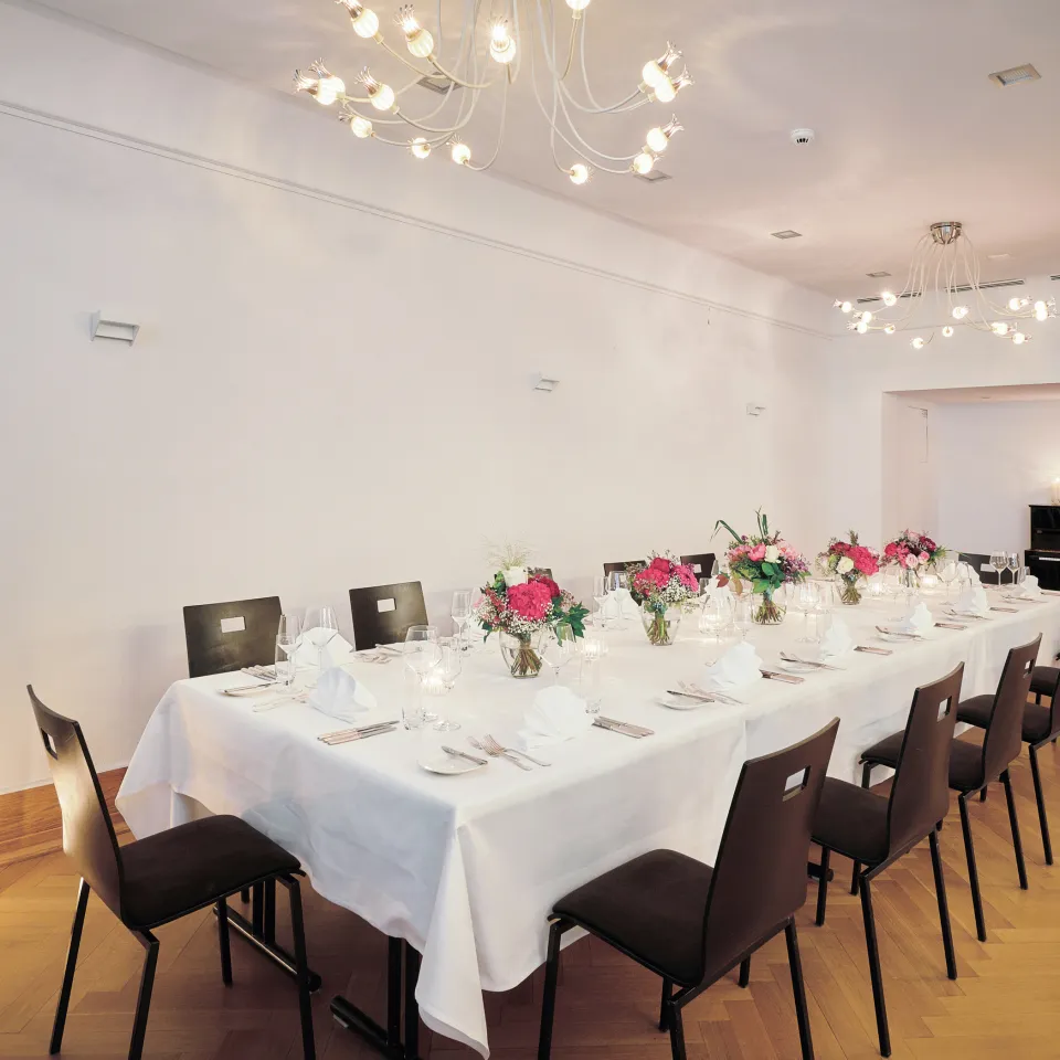 Crown hall in the Hotel Krone which is decorated for banquets