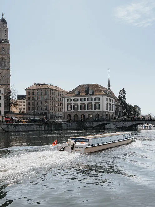 Boat on the Limmat with tourists